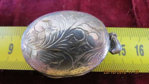 silver engraved locket, 11.7 grams, 4.5cm by 3cm, as per photo