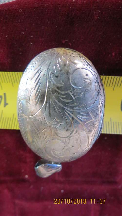 silver engraved locket, 11.7 grams, 4.5cm by 3cm, as per photo