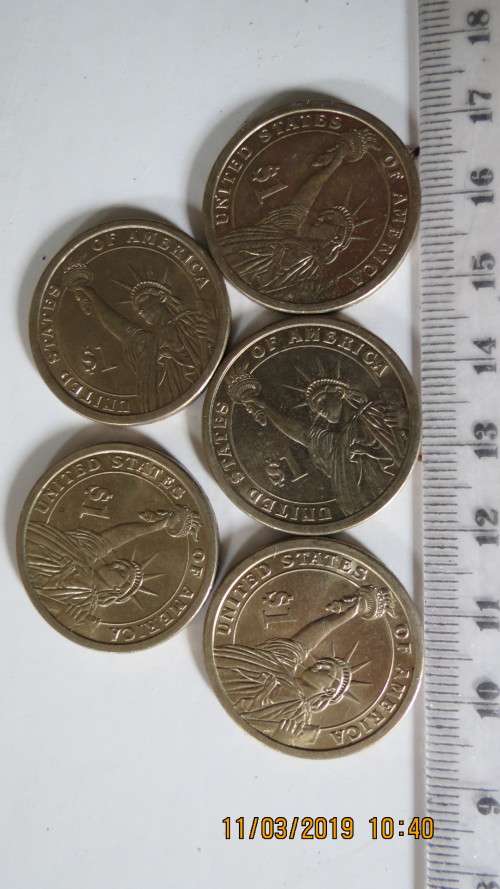 5 one dollar brass coins, as per photo
