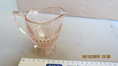 Carnival style glass milk jug, pink, 9cm high, as per photo
