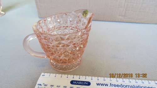 Carnival style glass milk jug, pink, 9cm high, as per photo