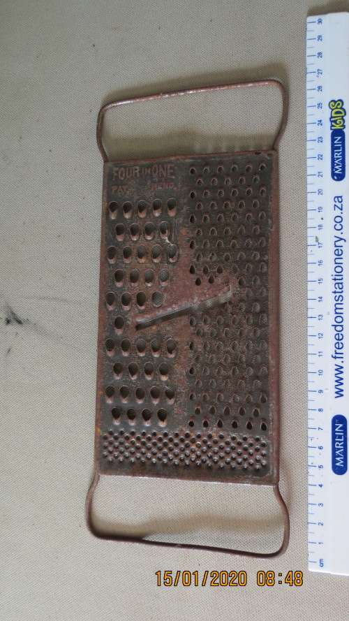 metal four in one grater, as per photo