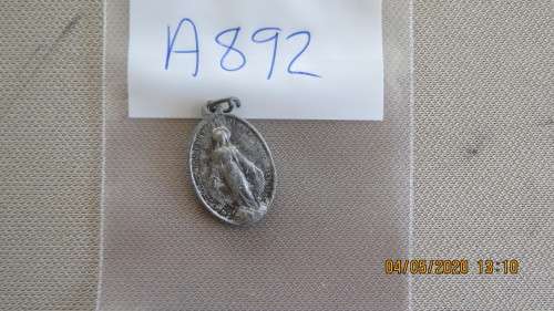 very old St Christopher medal, made from aluminium, on reverse a cross with the letter M,  as per ph