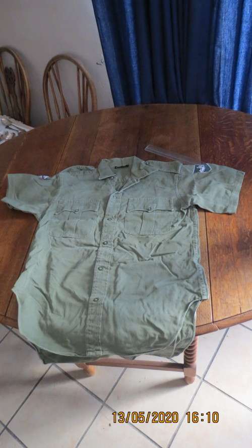 Old Rhodesian Army green shirt with sleeve badge's, made by Paramount,......., as per photo