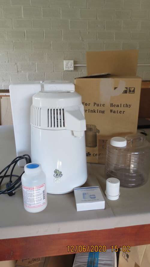 water distiller in box, some marking on inside otherwise in very good condition.....,as per photo