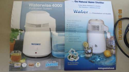 water distiller in box, some marking on inside otherwise in very good condition.....,as per photo