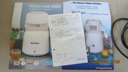 water distiller in box, some marking on inside otherwise in very good condition.....,as per photo
