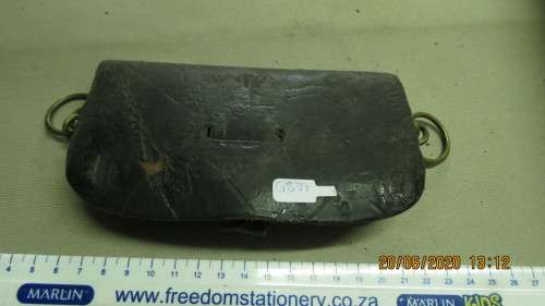 old leather pouch, 15cm long, brass loops on side, can see where badge came off, as per photo