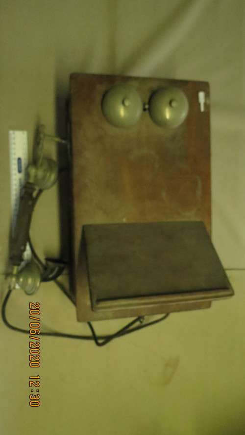 original old wall mount wooden telephone, with hand held ear and mouth piece,......., as per photo