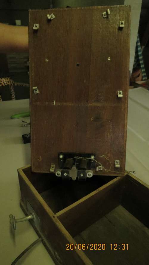 original old wall mount wooden telephone, with hand held ear and mouth piece,......., as per photo