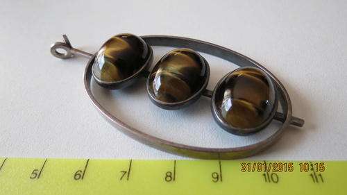 Silver and Tyger eye pendant, has WWL marking on back, as per photo