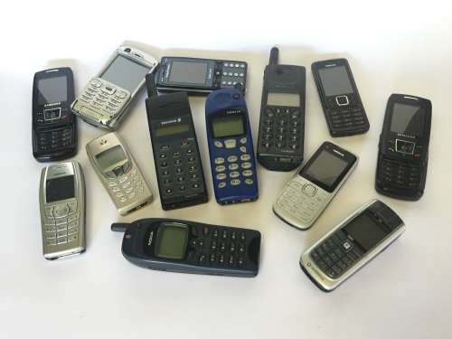 Collection of 13 Old Cellphones / Batteries / Chargers