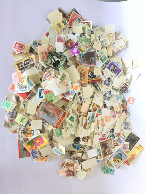 Hundreds Of Unsorted Stamps