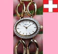 ADRIATICA 100% Swiss made Ladies Oval Gold PVD Bracelet Watch, Swarovski Crystal Imbeded Bezel