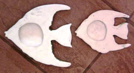 RARE PAIR OF LUCIA WARE FISH SHAPED WALL PLAQUES