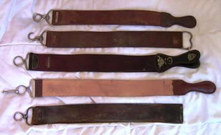 FIVE VINTAGE BARBER SHOP LEATHER RAZOR STROPS
