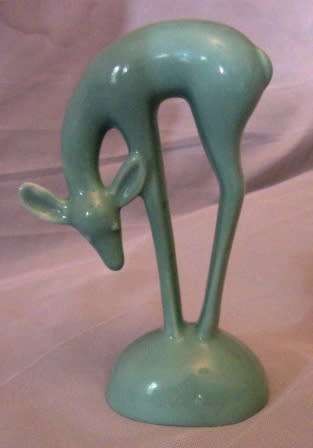 BLUE LUCIA WARE FIGURINE