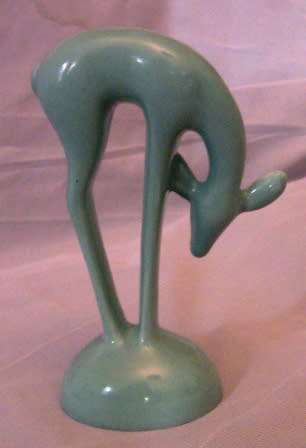 BLUE LUCIA WARE FIGURINE