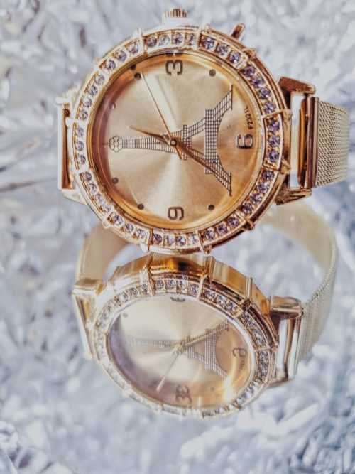 Ladies golden diamante Eiffel tower design wristwatch