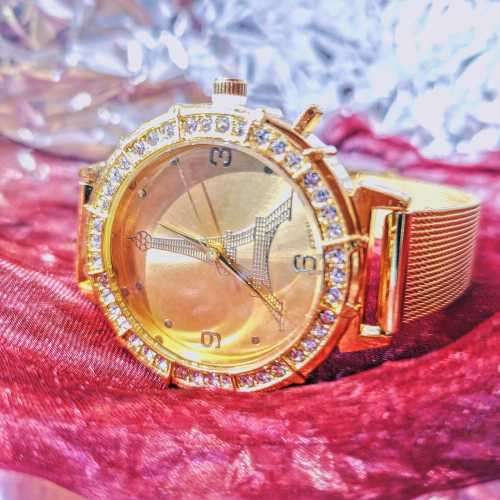 Ladies golden diamante Eiffel tower design wristwatch