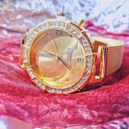 Ladies golden diamante Eiffel tower design wristwatch
