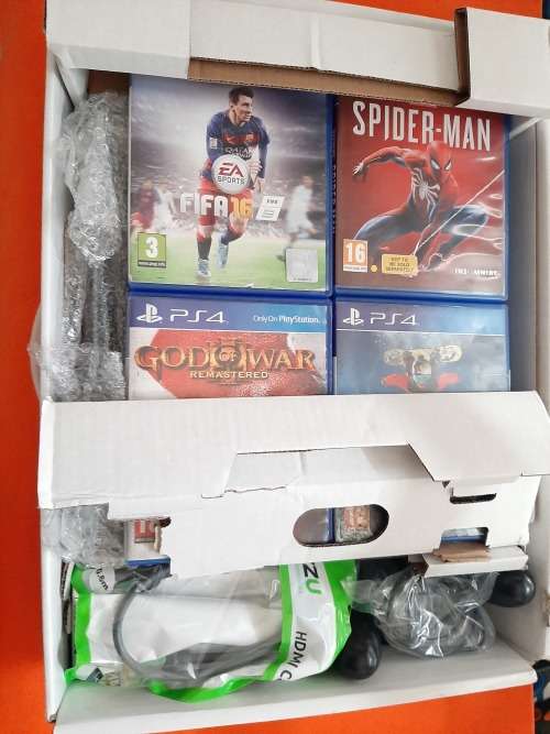 Playstation 4 1TB with 4 PS4 Games