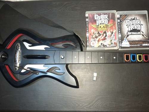 Guitar Hero + x1 Receiver x2 Games + x2 Guitars