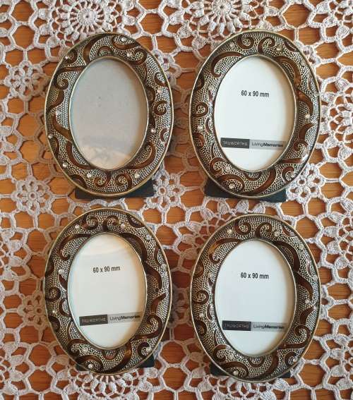 4 Pewter Photo Frames