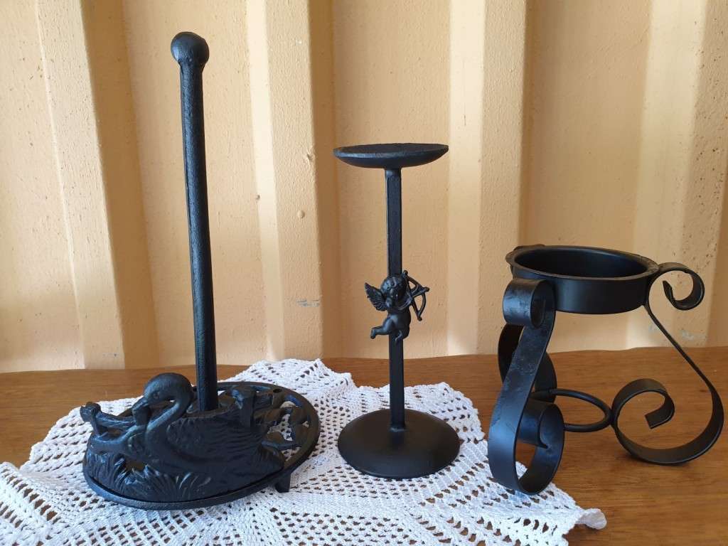 CAST IRON ROLL HOLDER AND TWO CANDLE HOLDERS