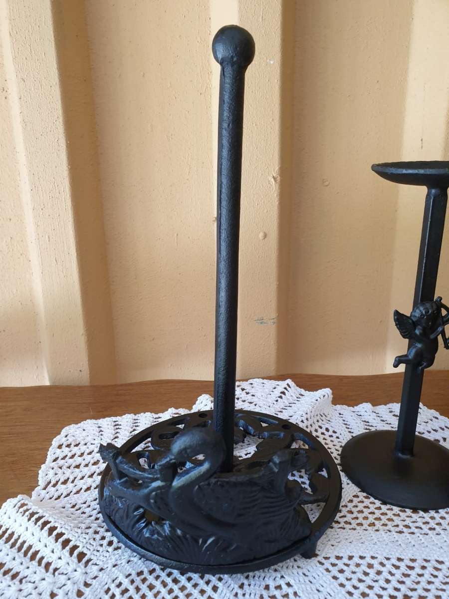 CAST IRON ROLL HOLDER AND TWO CANDLE HOLDERS
