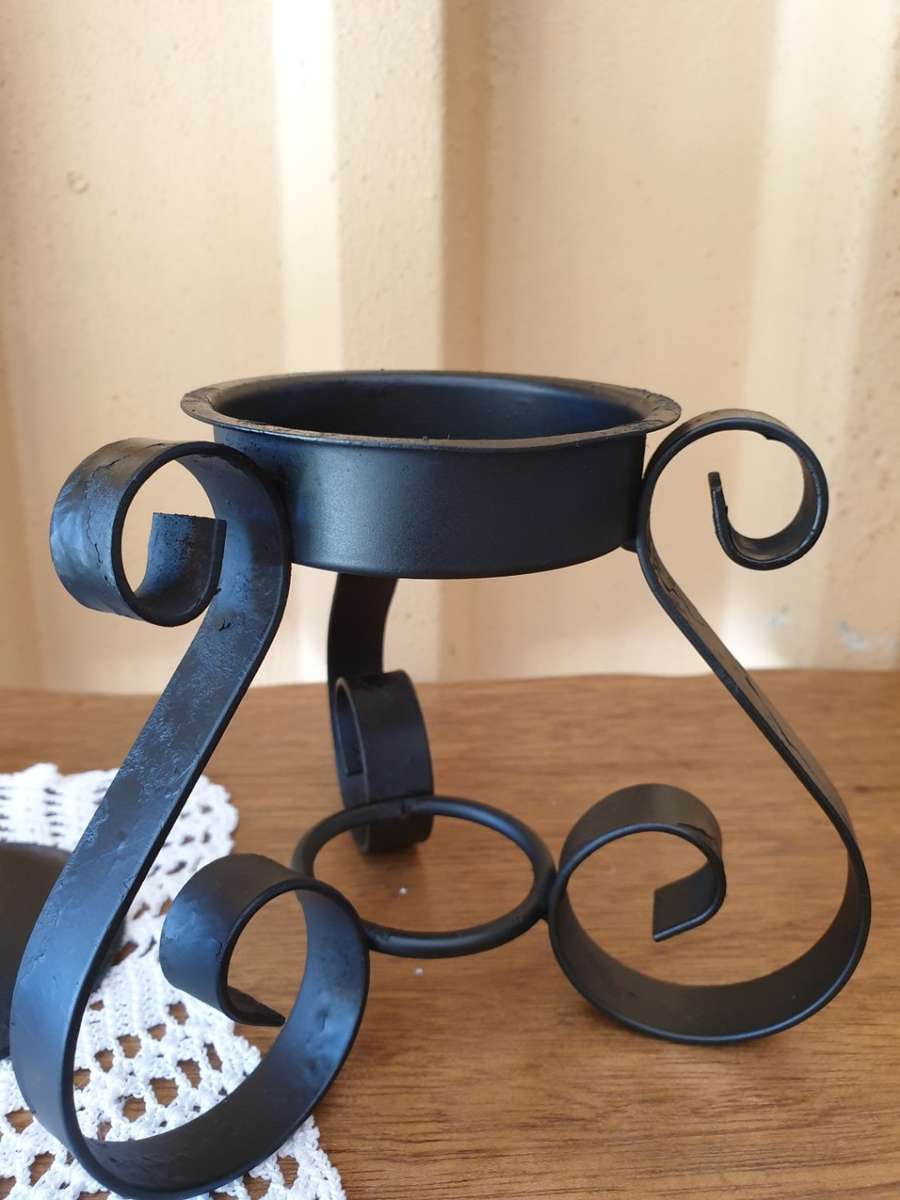 CAST IRON ROLL HOLDER AND TWO CANDLE HOLDERS