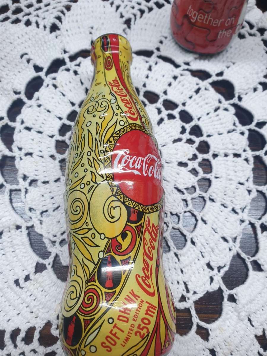coca-cola customer loyalty bottles