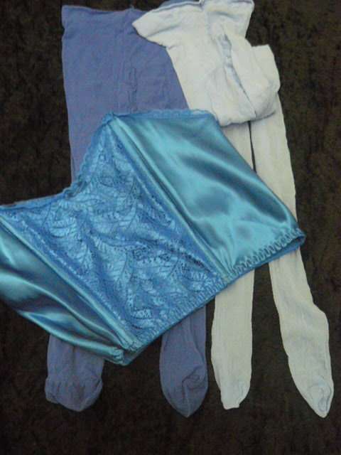 VICTORIAS SECREAT CORSET AND 2 PAIRS OF STOCKINGS