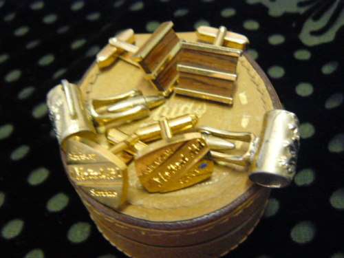 LEATHER BOX AND SOME CUFF LINKS