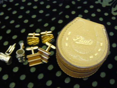 LEATHER BOX AND SOME CUFF LINKS