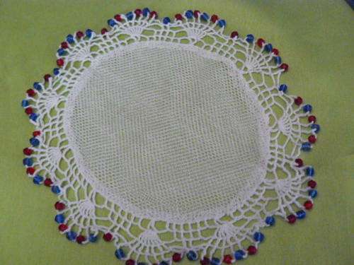 JUG COVER WITH BLUE AND RED BEADS 17 CM