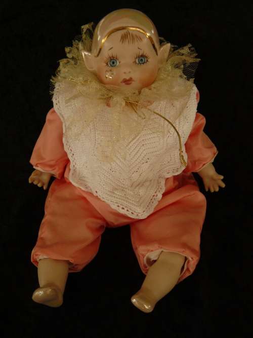HAND PAINTED COLLECTABLE PIXIE - COMES WITH A HAND CHROCETED BIB, BECAUSE SOMETIMES HE GETS A BIT ME