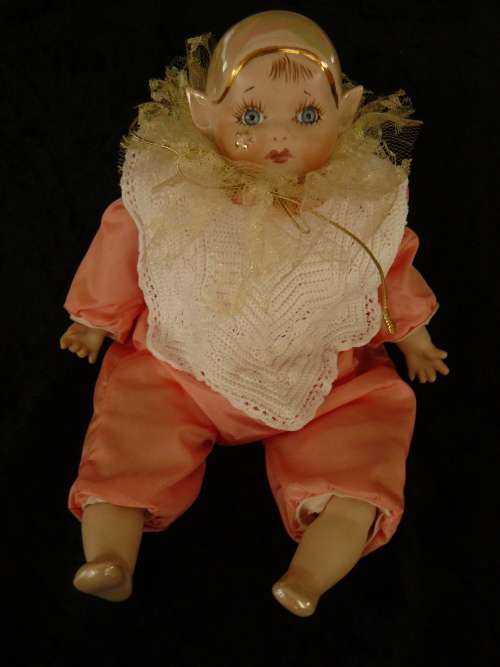 HAND PAINTED COLLECTABLE PIXIE - COMES WITH A HAND CHROCETED BIB, BECAUSE SOMETIMES HE GETS A BIT ME