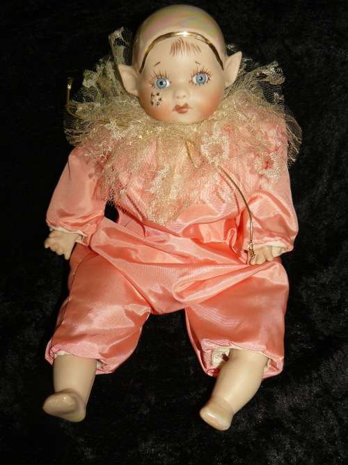 HAND PAINTED COLLECTABLE PIXIE - COMES WITH A HAND CHROCETED BIB, BECAUSE SOMETIMES HE GETS A BIT ME