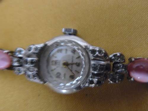 WATCH WITH PENDANT ON CHAIN AND CLIP ON EARRINGS LOT