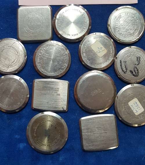 4 lots of different types of watch spares