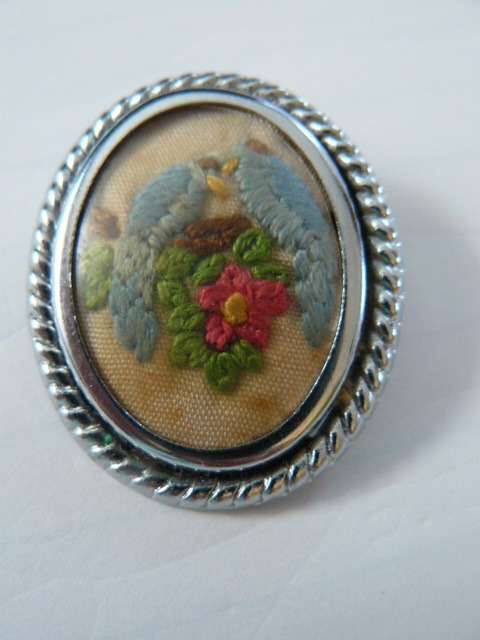 BROOCH SILVER TONED WITH EMBROIDERY