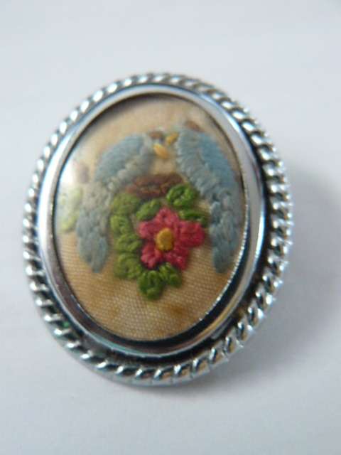 BROOCH SILVER TONED WITH EMBROIDERY