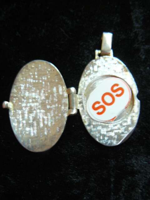 SOS SILVER TONED LOCKET - PENDANT