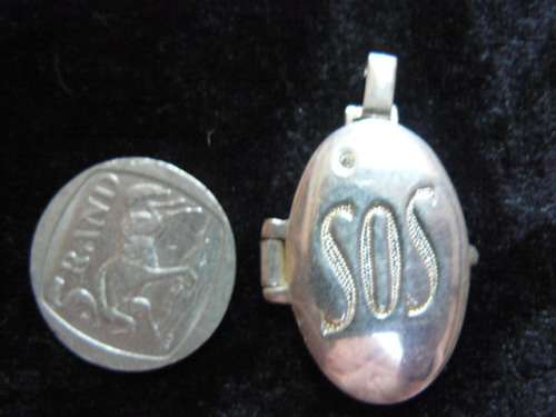 SOS SILVER TONED LOCKET - PENDANT