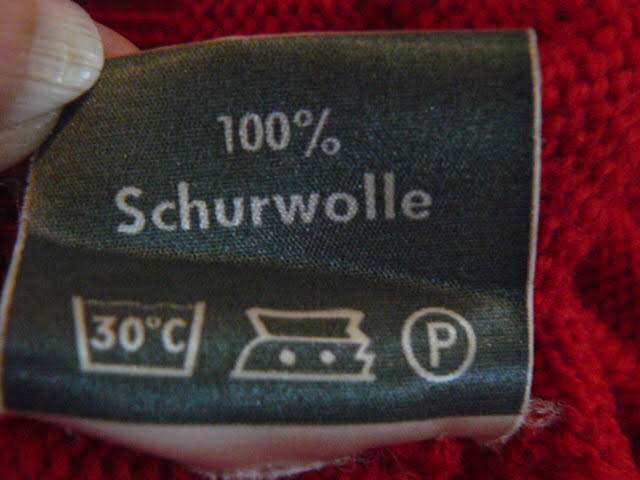 RED JERSERY SIZE M 74 CM LONG 100 % WOOL