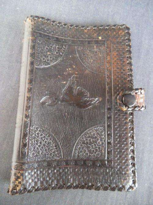 LEATHER BOOK COVER WITH BEAUTIFUL STAMPED DETAIL