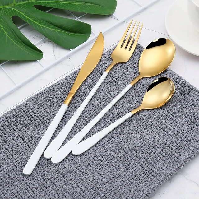 24 PC GOLD AND WHITE CUTTLERY SET