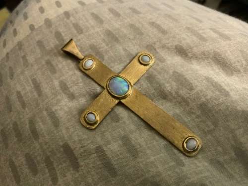 Gold cross pendant with opal