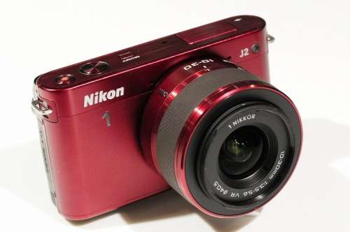 Nikon 1 J2 with 30-110 lens *  Maroon colour * Lens hood and cap * Battery and charger